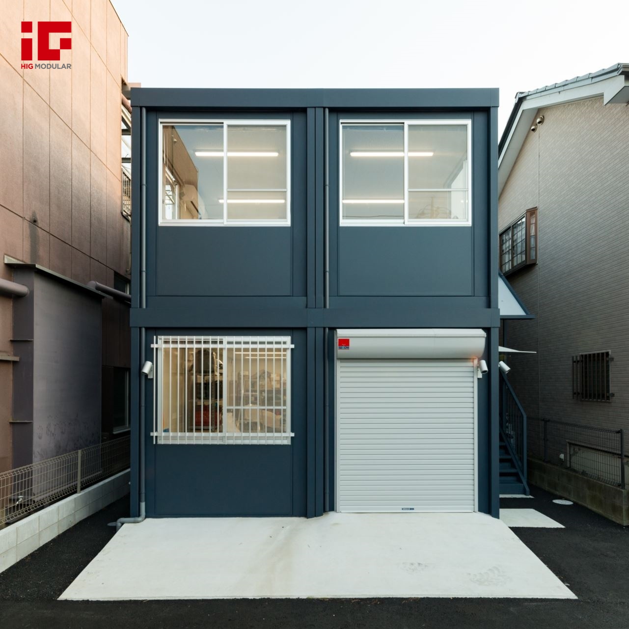 A Two-Story Container Office That Blends Storage, Parking, and Studio Space